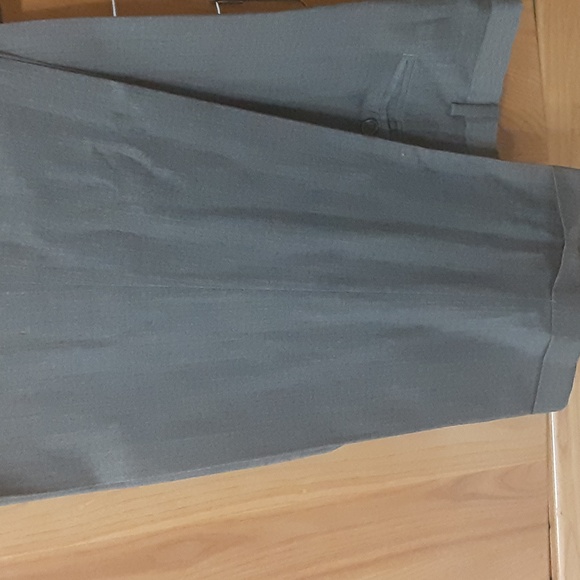 A grey pair of dress slacks made by dockers size 34/34 - Picture 5 of 6